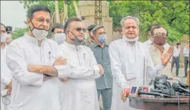  ?? PTI ?? Rajasthan chief minister Ashok Gehlot with Congress leaders Randeep Surjewala, Avinash Pandey and Ajay Maken in Jaipur on July 24.