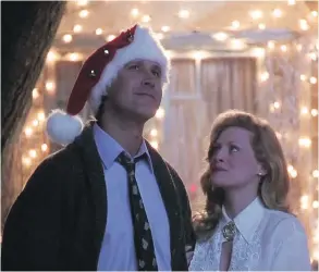  ?? WARNER BROS. ?? Chevy Chase and Beverly D’Angelo in National Lampoon’s Christmas Vacation.