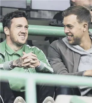  ?? PICTURE: ALAN RENNIE/SNS ?? 0 Brian Graham converts a penalty to make it 4-0, as new Hibs recruits Danny Swanson, left, and Steven Whittaker watch on from the stand.