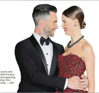  ?? — AFP ?? Levine and wife Prinsloo are expecting their first child.