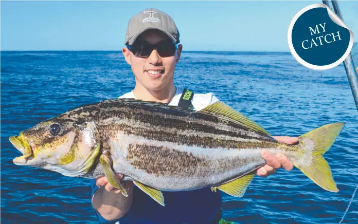  ??  ?? Jonah Yick with a South East Coast striped trumpeter.