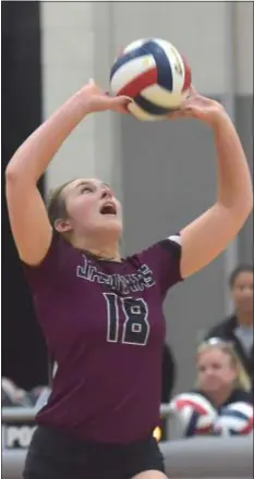  ?? PETE BANNAN – DIGITAL FIRST MEDIA ?? Garnet Valley’s Rachel Cain sets a ball in the first game of what became a 3-0 Jaguars victory over Emmaus early this season.