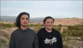  ?? MARY HUDETZ — THE ASSOCIATED PRESS ?? In this Friday photo, Thomas Gray, left, and Lloyd Gray stand together with the Sangre de Cristo Mountains in the background outside Santa Fe, N.M.