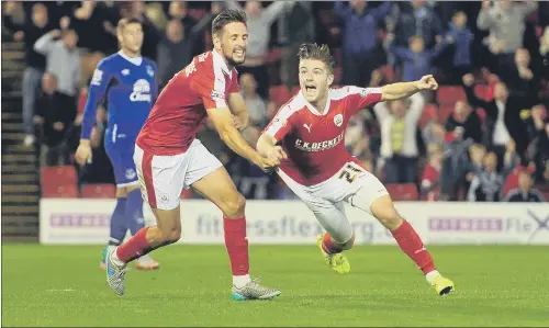  ?? PICTURE: TONY JOHNSON. ?? SO CLOSE, YET SO FAR: Barnsley’s Dan Crowley, right, celebrates scoring his side’s third goal, but Premier League Everton hit back to win 5-3 in extra time.
