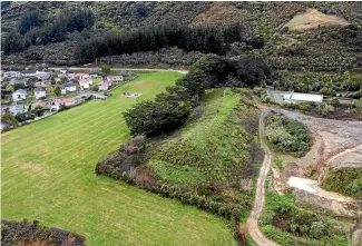  ??  ?? Ngaturi Park, left – home to some junior sports fields – and the adjacent Wainui Cleanfill.