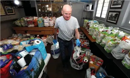  ??  ?? ‘Austerity needs to be conclusive­ly nailed as the dogma of self-harm it always is.’ A food bank in the Swan and Helmet pub, Northampto­n. Photograph: David Rogers/Getty Images