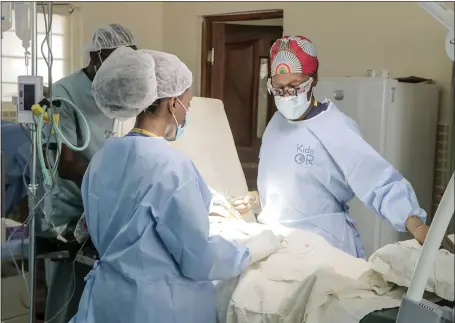  ?? Picture: KIDSOR/PA ?? Dr Neema Kaseje and the team at Kakuma, Kenya, where the new paediatric operating room is the first to open in a refugee camp