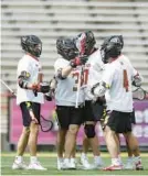  ?? TERPS ATHLETICS/HANDOUT ?? The Maryland men’s lacrosse team celebrates after scoring a goal against Ohio State on Saturday, at SECU Stadium in College Park.