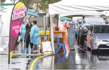  ?? — AFP file photo ?? Motorists queue at the Otara testing station after a positive Covid-19 coronaviru­s case was reported in the community as the city enters a level 3 lockdown in Auckland on February 15.