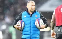  ?? — AFP photo ?? Eddie Jones takes part in the warm-up ahead of the autumn internatio­nal rugby union match between England and New Zealand at Twickenham stadium in south-west London in this Nov 10 file photo.