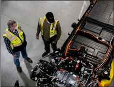  ?? BRITTANY GREESON — THE NEW YORK TIMES ?? An overhead view of the 2022 Ford F-150 Lightning’s chassis, including its engine and batteries, at the automaker’s plant in Dearborn, Mich., on Jan. 25.