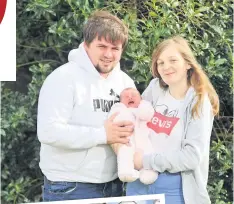  ??  ?? Top Muthill’s Susan Crawford and Corinna Robertson at the community larder
Above Crieff’s Declan Scott and Katie Roddis with daughter Olivia, who was born during lockdown