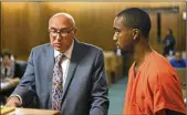  ?? DAKE KANG / AP 2017 ?? Public defender David Magee (left) and defendant Hercules Shepherd appear in a Cleveland courtroom.