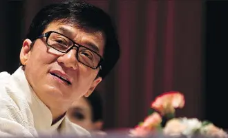  ?? MANAN VATSYAYANA/AFP/GETTY IMAGES ?? In his Memoir, Never Grow Up, action film star Jackie Chan admits to fathering a child amid an affair, throwing his young son by his wife across a room, and driving drunk many times.