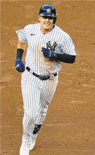  ?? GETTY ?? Gio Urshela is all smiles after hitting grand slam in second inning last night against Red Sox.