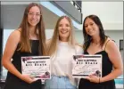  ?? Annette Beard/Pea Ridge TIMES ?? Lady Blackhawks Emory Bowlin and Callie Cooper were given certificat­es by assistant coach Elzie Yoder for being named All State.