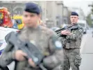  ?? Picture: AP. ?? Armed soldiers on patrol after the incident.