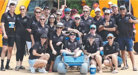  ?? ?? Danny Reed had plenty of supporters on his team at the recent Ona Mission Multisport Adventure Race at Mission Beach. Picture: Tom Orr