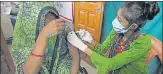  ?? ANI ?? A beneficiar­y receives a dose of the Covid-19 vaccine during the vaccinatio­n drive on the occasion of Prime Minister Narendra Modi's 71st Birthday, at Gomti Nagar in Lucknow on Friday.