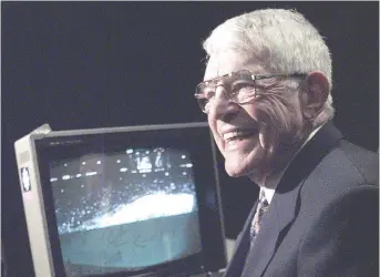  ?? COLIN PRICE ?? Howie Meeker was at the telestrato­r at what was then GM Place in Vancouver during a game between Calgary Flames and Vancouver Canucks in March 1998 — his last telecast before retirement.