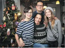  ?? AL CHAREST ?? Guillermo Rojas Vertiz, his wife Irma Canut and their children, Guillermo, 12, and Constanza, 15, in their Okotoks home.