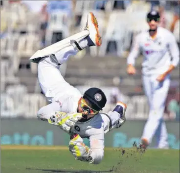  ?? BCCI ?? After staying unbeaten on 58, Rishabh Pant took two spectacula­r catches on Sunday, this one to dismiss Jack Leach.