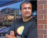  ?? CHARLES REX ARBOGAST/AP ?? Manish Mallick, owner of the Indian restaurant ROOH, poses for a portrait outside the West Loop restaurant in Chicago in July.