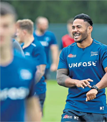  ??  ?? Welcome aboard: Manu Tuilagi trains with his new team-mates at Carrington