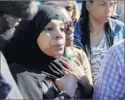  ?? Elise Amendola
Associated Press ?? RAHIMAH RAHIM, left, mother of Usaamah Rahim. Police say they will release video of his shooting.