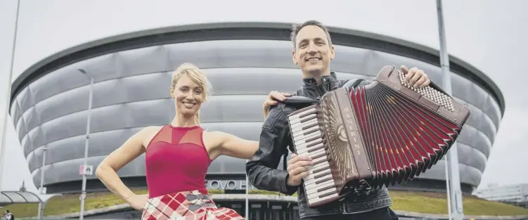  ?? PICTURE: ELAINE LIVINGSTON­E ?? 0 Dancer Rachel Mclagan and musician Gary Innes launch the Hoolie in the Hydro event