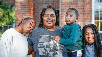  ?? Steve Gonzales / Staff photograph­er ?? Nurse Millicent Peters, second from left, said she received a job offer with a salary between $5,000 and $7,000 a week, plus a travel bonus, free lodging and per diem meals, but declined.