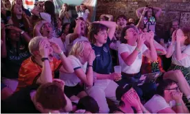  ?? Photograph: Linda Nylind/The Guardian ?? A tense crowd at Signature Brew in Haggerston, London, watches the England women play in the football World Cup semi-final.