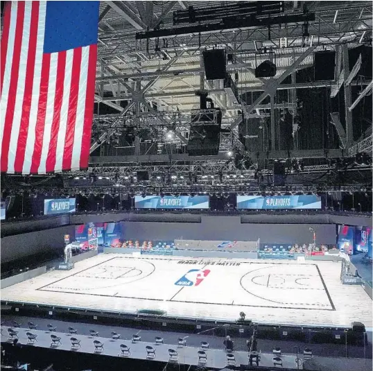  ?? /ASHLEY LANDIS/AP ?? The court sits empty after a postponed NBA basketball first round playoff game between the Milwaukee Bucks and the Orlando Magic, Wednesday.