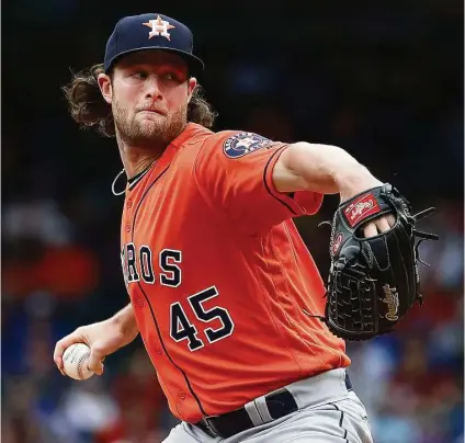  ?? Karen Warren / Houston Chronicle ?? In recording his first victory as an Astro, Gerrit Cole allowed two hits — one a Joey Gallo solo homer — and three walks.