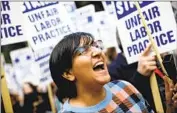  ?? ?? TANYA GUPTA, a postdoctor­al researcher, marches with striking academic workers on Monday at UCLA.