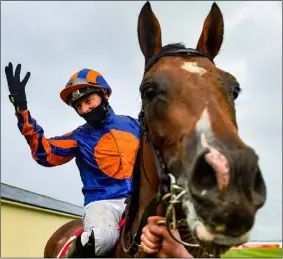  ??  ?? Jockey Seamie Heffernan celebrates after piloting Santiago to victory in the Irish Derby for trainer Aidan O’Brien.