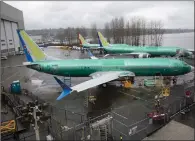  ??  ?? New 737 Max 8s at Boeing’s Washington state plant