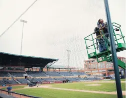  ?? WHITNEY KELLER/ASSOCIATED PRESS FILE ?? Durham Bulls Athletic Park is home to one of the most popular teams in the minors, but more than half of the team’s front-office staff is on furlough.