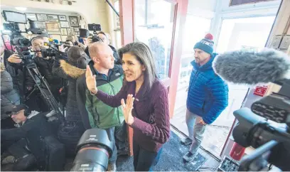  ?? Picture: AFP ?? HOPEFUL. Former UN ambassador and Republican presidenti­al hopeful Nikki Haley enters Robie’s Country Store in Hooksett, New Hampshire. She is trailing former president Donald Trump in polls.