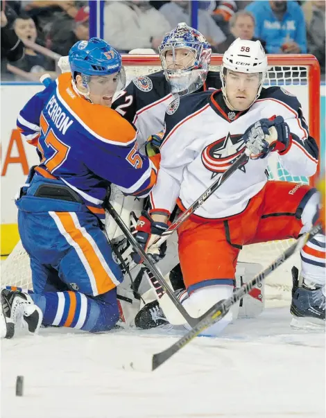  ?? Shaughn But ts/Edmonton Journal ?? Oilers forward David Perron may be that irritating guy who runs his mouth while running the net, but he can score goals, too.