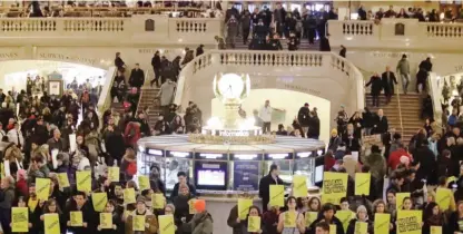  ?? — AP ?? NEW YORK: Supporters of Amnesty Internatio­nal gather inside Grand Central Terminal to protest President Donald Trump’s immigratio­n policies on Friday, March 3, 2017, in New York.