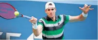  ?? AFP ?? The extreme weather conditions and a tough opponent in Del Potro compelled Isner to change his T-shirt 11 times. Isner, however, lost the match which lasted three hours and 31 minutes. —