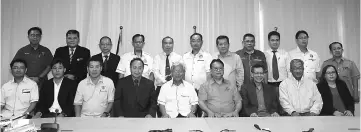  ??  ?? Masing (seated centre) and his URDA board members after the meeting.