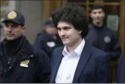  ?? SETH WENIG — THE ASSOCIATED PRESS FILE ?? FTX founder Sam Bankman-Fried leaves Manhattan federal court in New York on Jan. 3after he pleaded not guilty to charges that he cheated investors and looted customer deposits on his cryptocurr­ency trading platform.