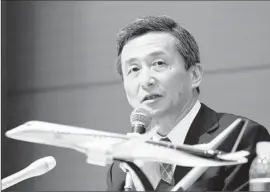  ?? Jiji Press ?? HIROMICHI MORIMOTO, president of Japan’s Mitsubishi Aircraft, speaks at a news conference Friday about plans for the company’s MRJ regional jet.