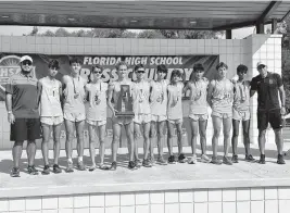  ?? ?? The Belen Jesuit boys’ cross-country team won its 14th overall state title on Saturday.