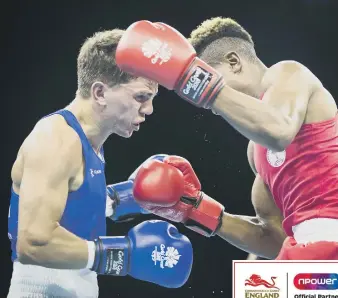  ??  ?? Luke McCormack scraps against Namibia’ s Jonas Jonas in his semi-final.