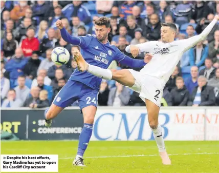  ??  ?? &gt; Despite his best efforts, Gary Madine has yet to open his Cardiff City account