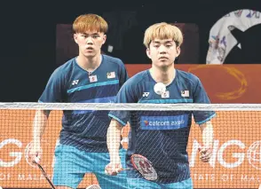  ?? Bernama file photo ?? Kai Wun (le ) and Wei Chong in action during a men’s doubles match. —