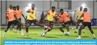  ?? AFP ?? ABIDJAN: Ivory Coast’s National Football team players take part during a training session at the technical’s highschool stadium of Abidjan, on the eve of the 2024 Africa Cup of Nations (CAN) football match between Ivory Coast and Guinea Bissau. —